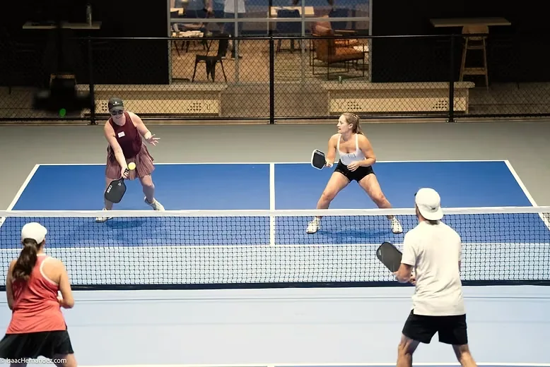 League play across the indoor courts at The Grove