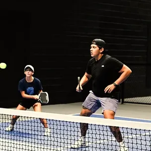 Two players at the net